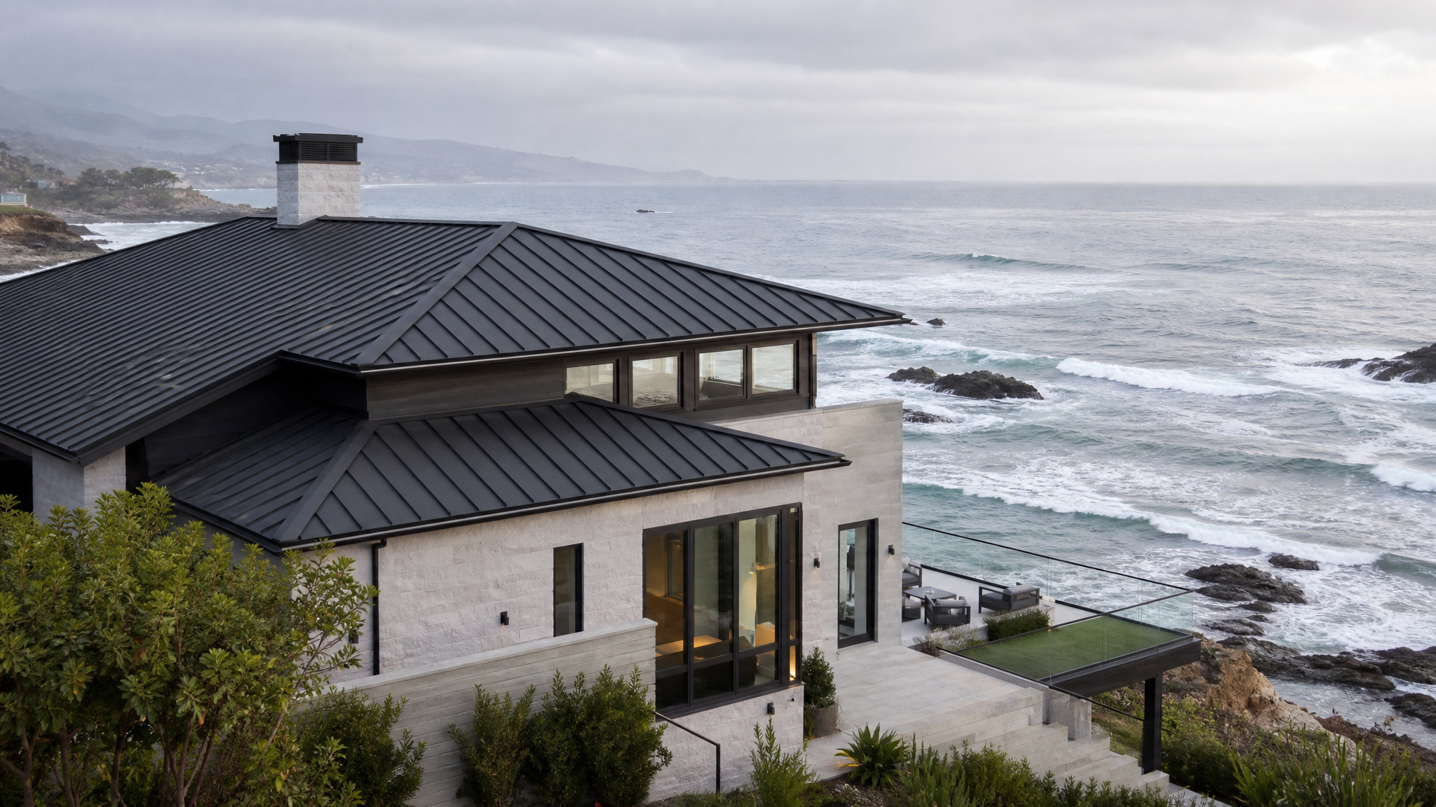 Close-up of standing seam aluminum roofing installed on a luxury coastal residence highlighting concealed seams and premium finish quality