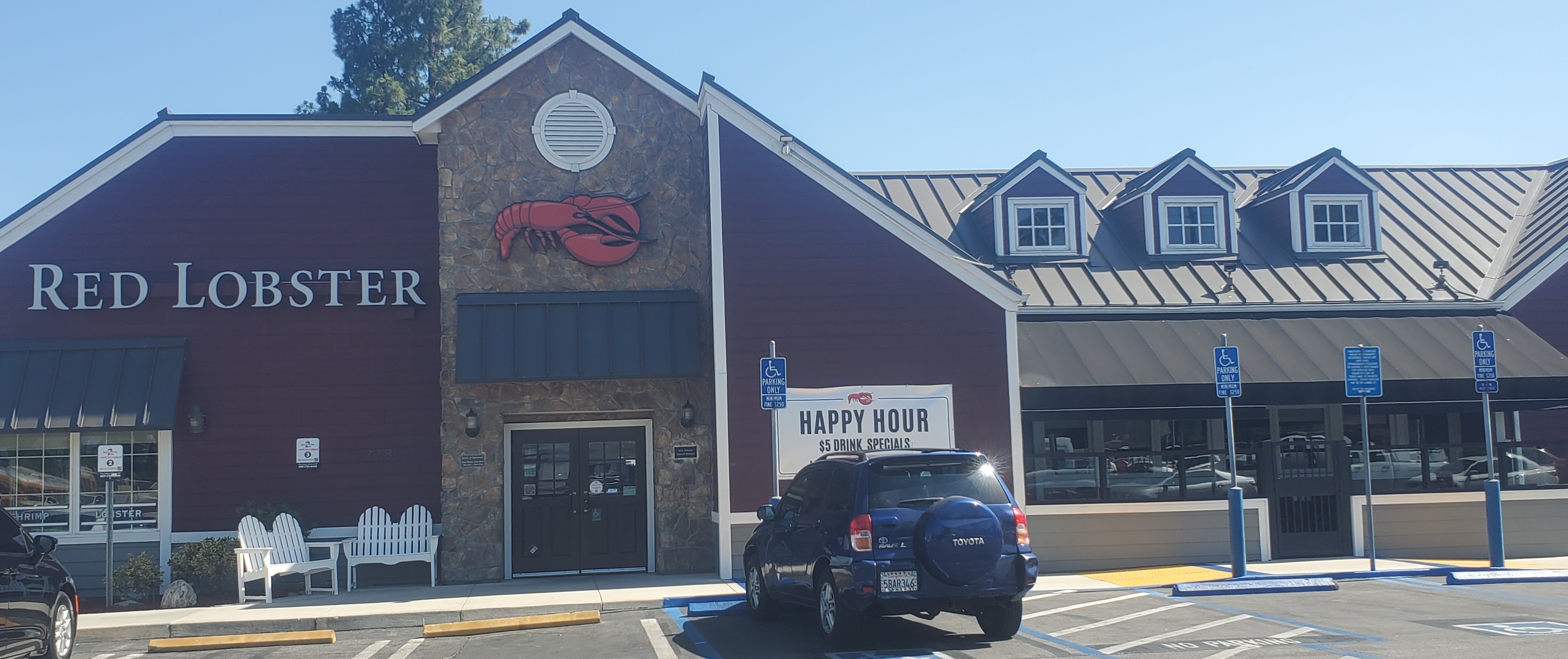 Bronze standing seam metal roof on a Red Lobster restaurant in Valencia