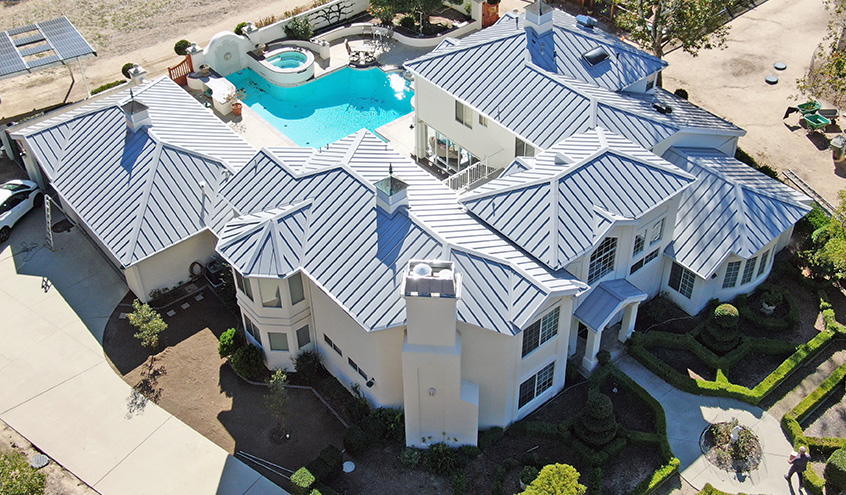 Luxury custom home with 24-gauge standing seam metal roof