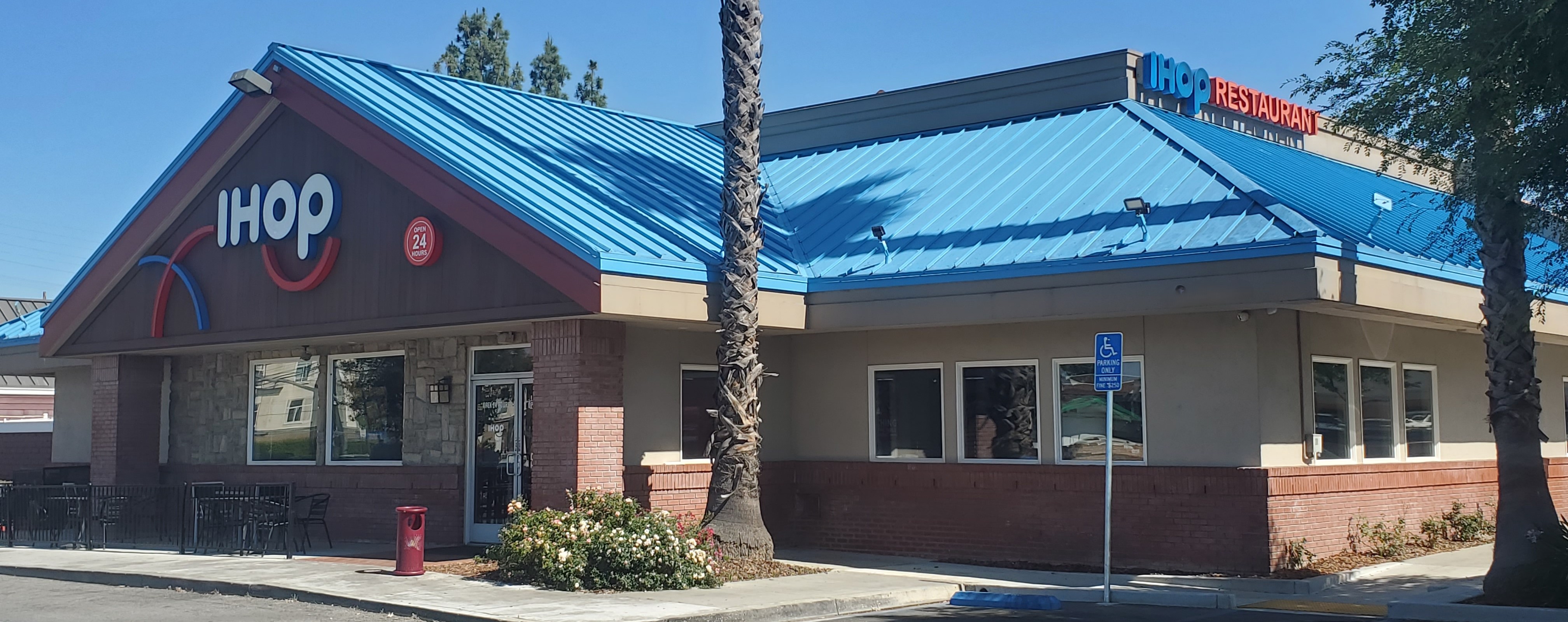 Standing seam metal roof installation on a commercial building in Woodland Hills, California